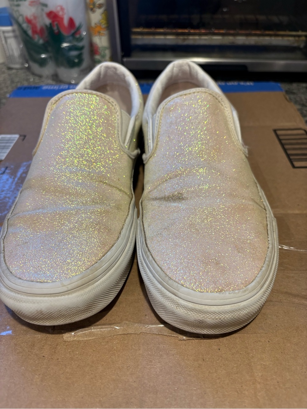 Vans Womenâs Slip-On Glitter Sneakers in Iridescent Pearl